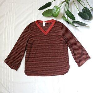 Couture v-neck orange and black striped long sleeve